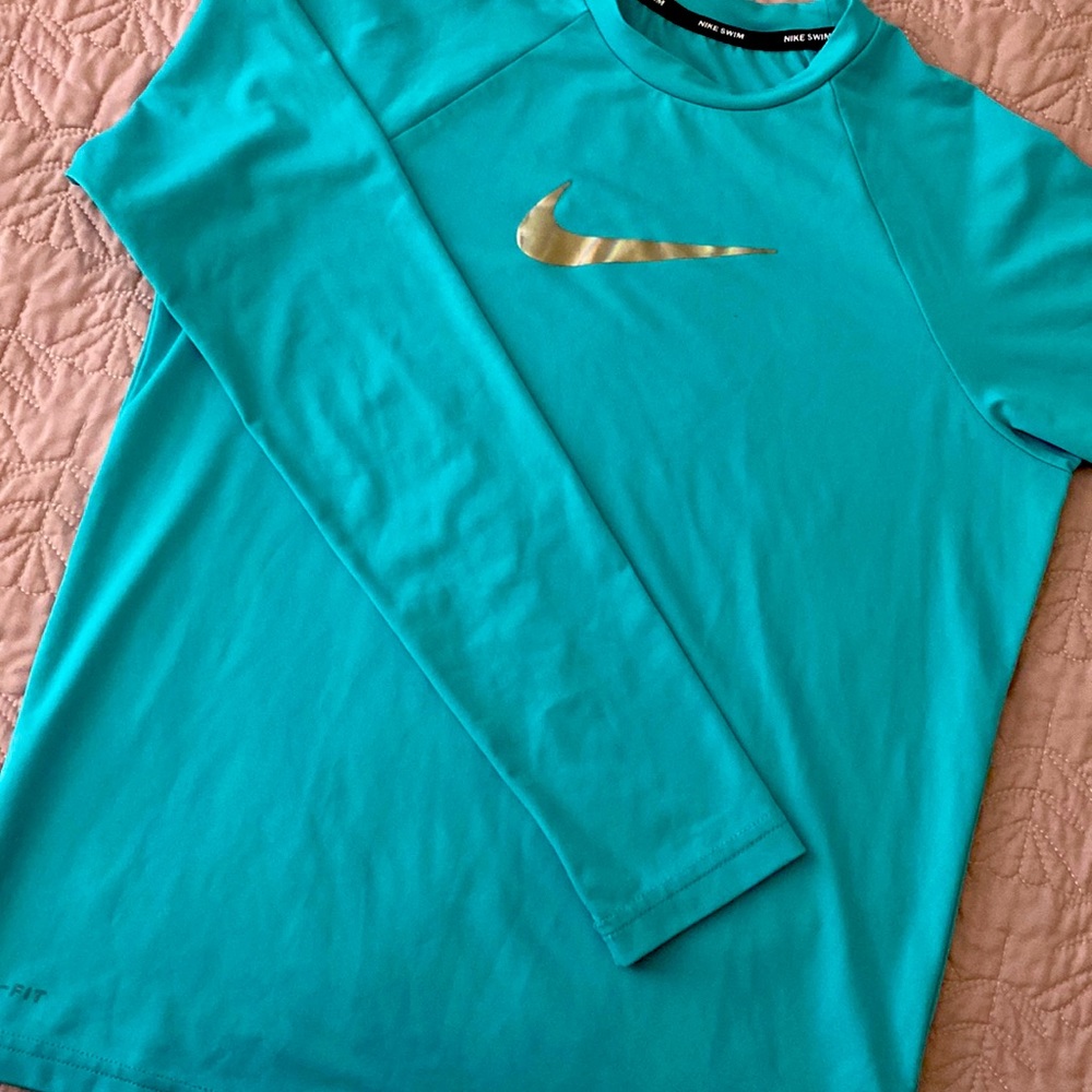 Swim shirt unisex color blue , like new